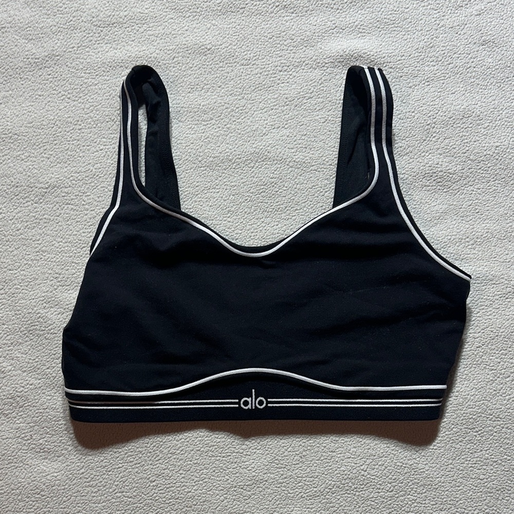 ALO Yoga Airbrush Heart Throb Bra in Black with white trim.